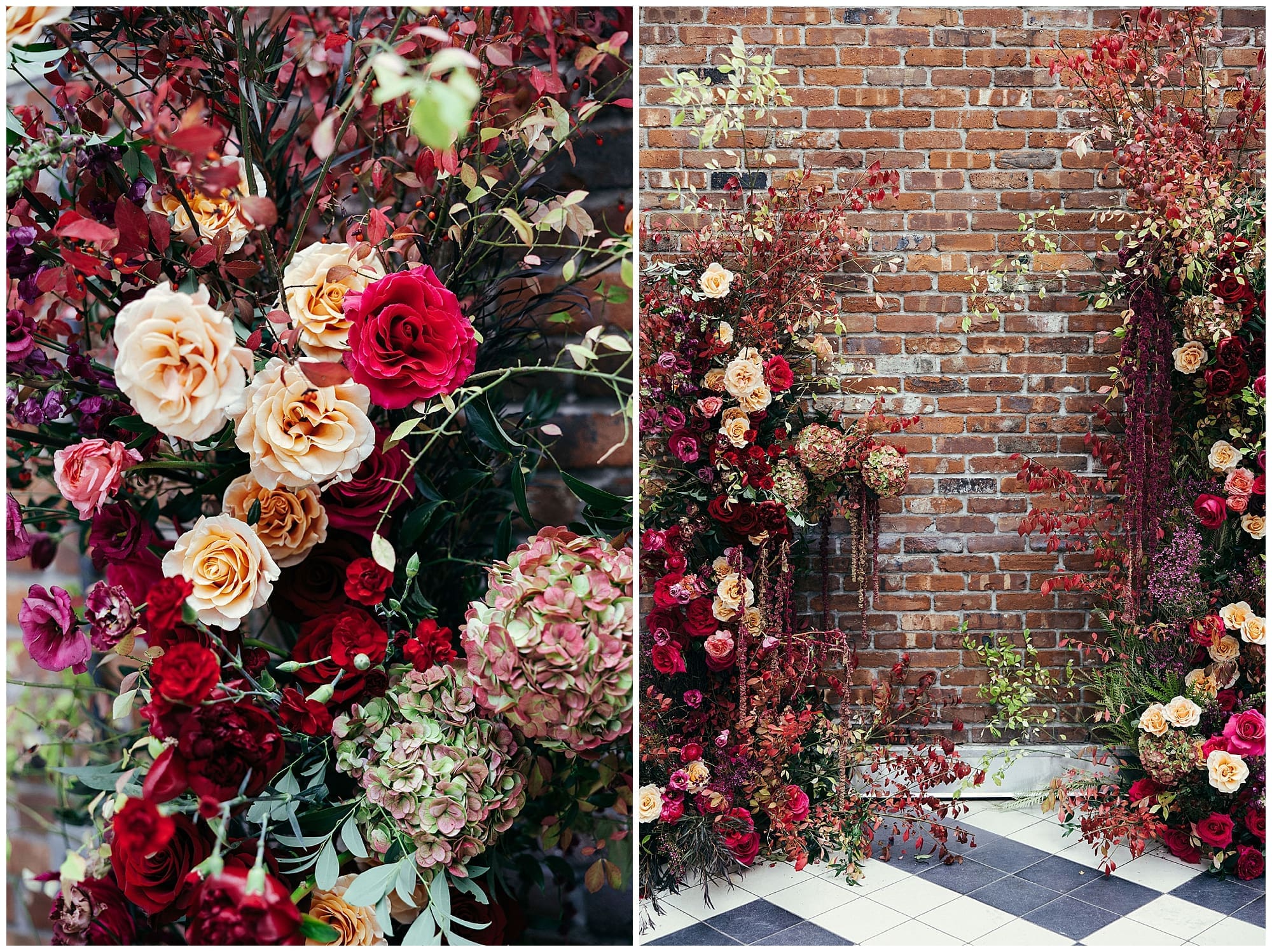 A sweeping floral installation of deep red, burgundy, blush, and peach wedding florals cascades against the exposed brick wall at the Wythe Hotel in Brooklyn, New York, created by the couple's New York City wedding florist.